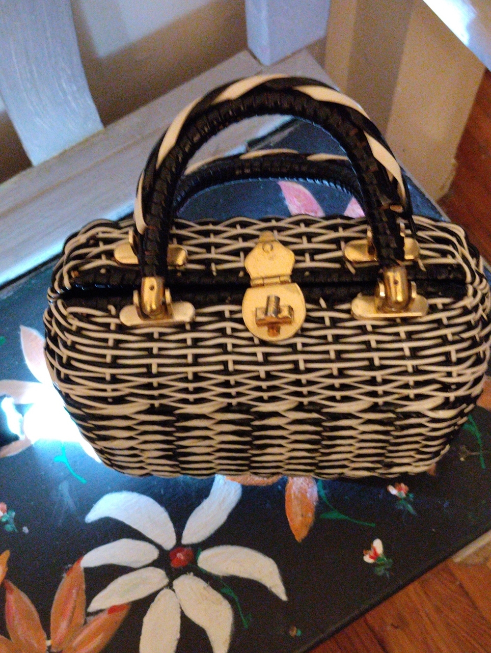 Black and White Woven Top-Handle Handbag with Gold Hardware